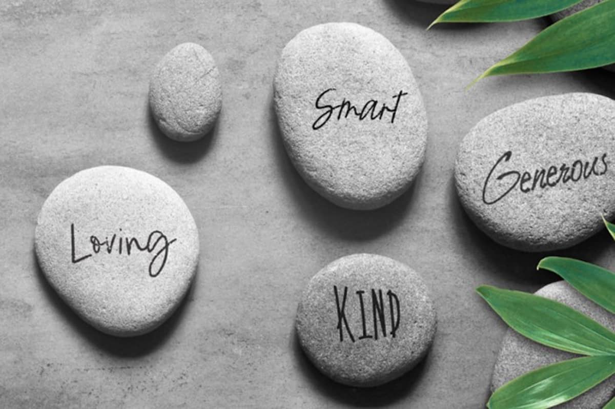 Rocks and different ones say "Loving", "Smart", "Kind", and "Generous"