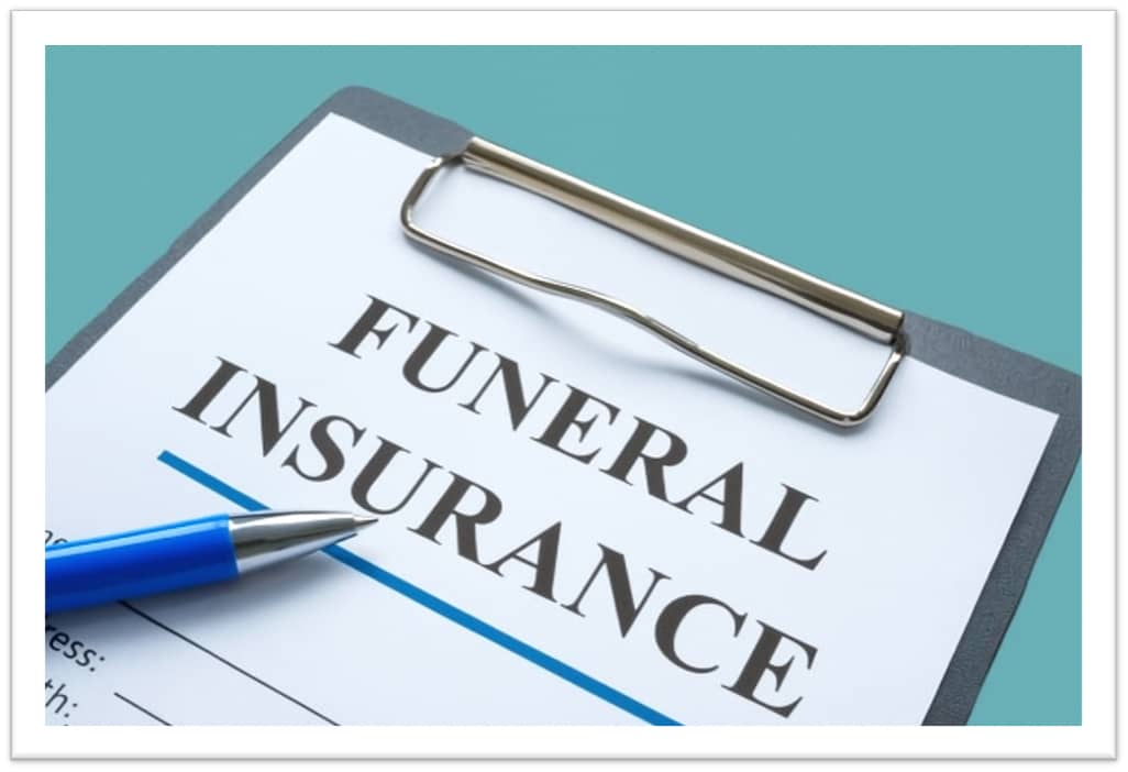 A piece of paper on a clipboard that says "Funeral Insurance"