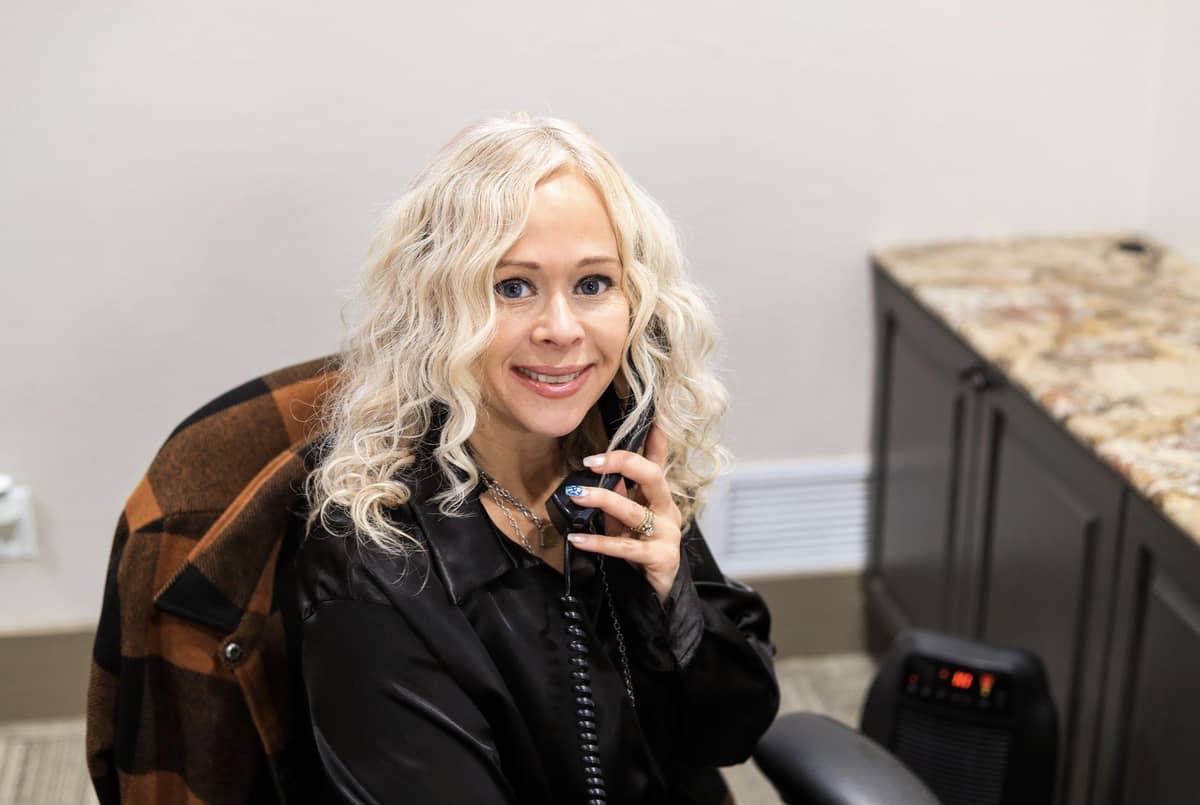 Sunset Funeral Home employee on the phone